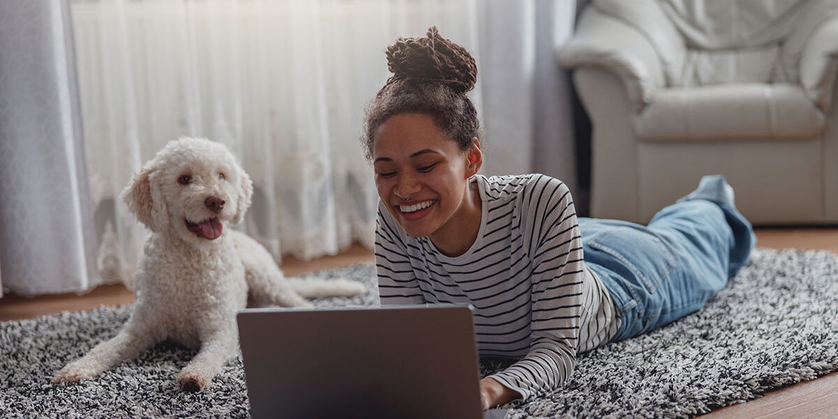 Researching Internet With Dog