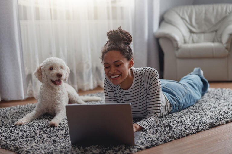 Researching Internet With Dog